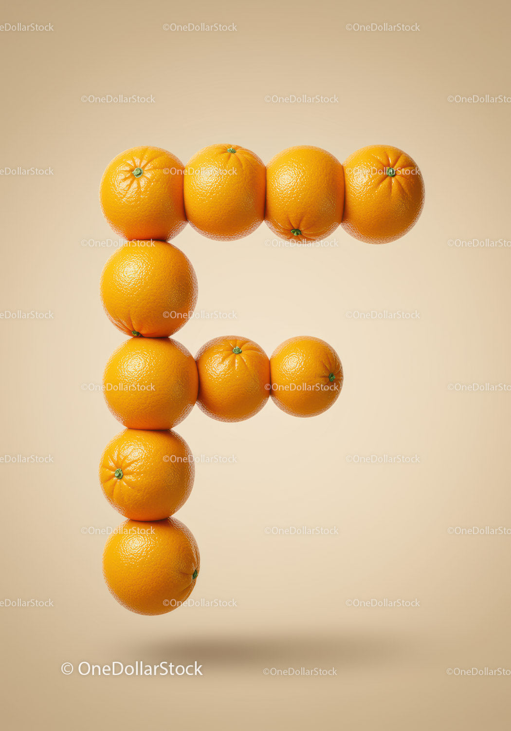 Creative Letter F Made From Fresh Oranges On Beige