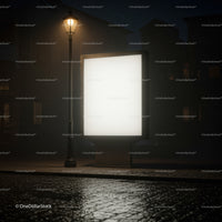 Empty illuminated billboard and streetlamp at night