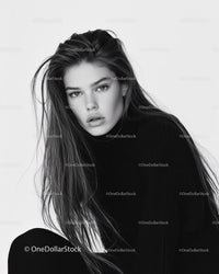 Black and White Portrait of a Young Woman with Intense Expression