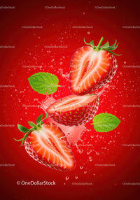 Fresh strawberry halves with mint leaves and water splash
