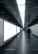 Minimalist Subway Tunnel with Tiled Walls and Modern Lighting