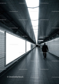 Minimalist Subway Tunnel with Tiled Walls and Modern Lighting
