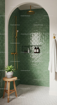 Modern shower with green scallop tiles and gold fixtures