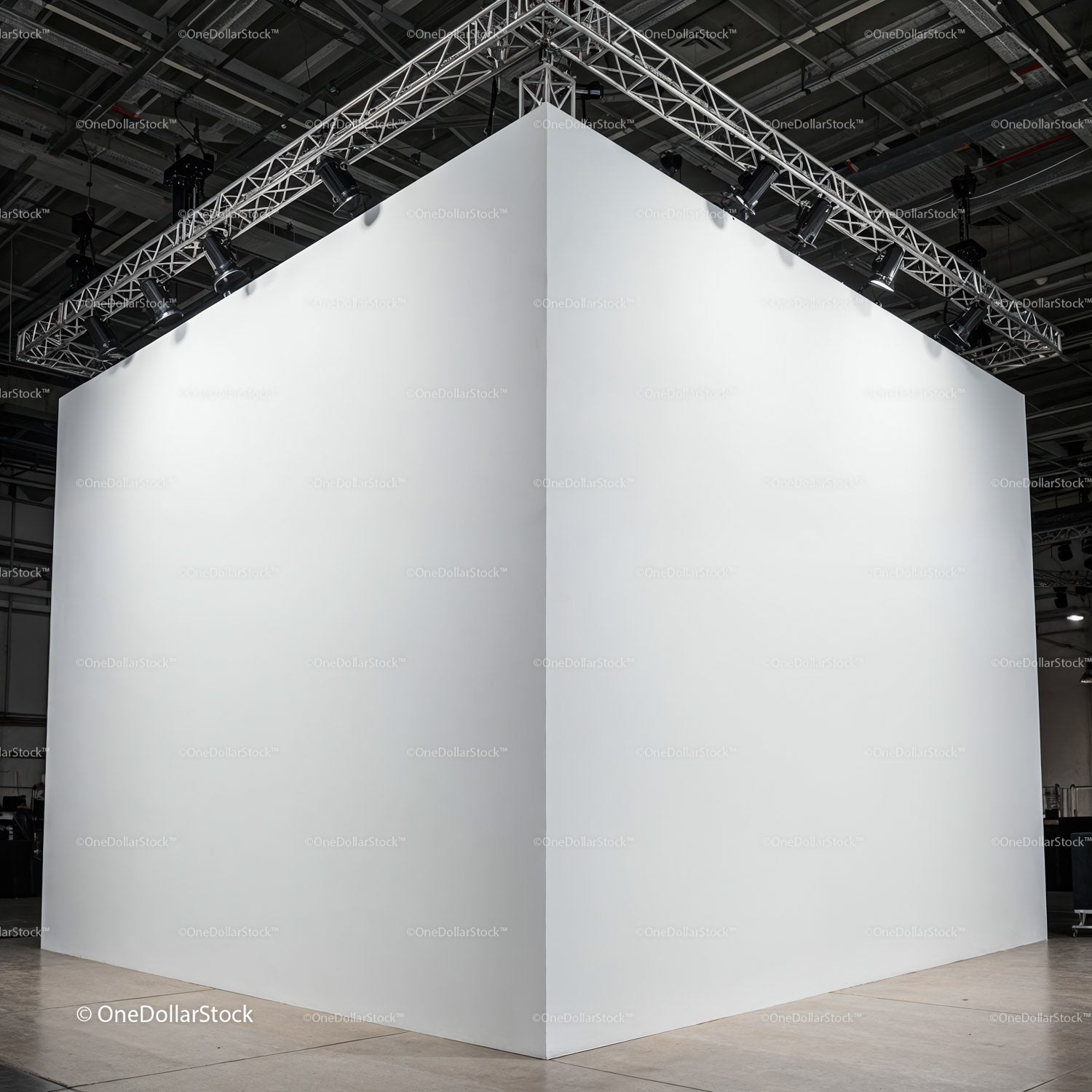 Large blank white panels in industrial studio space