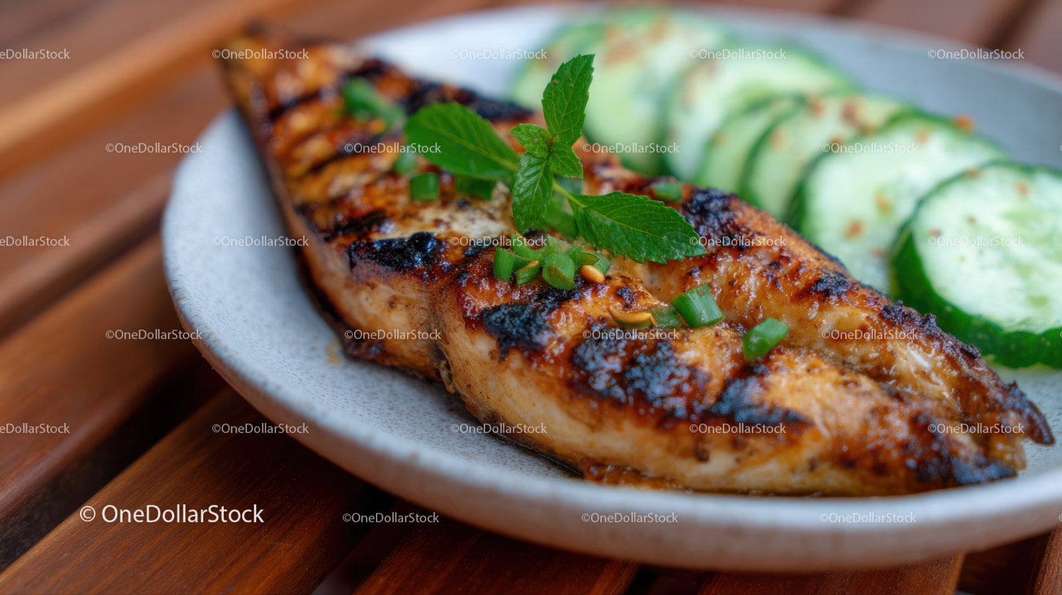 Grilled Fish Fillet with Fresh Cucumber Slices and Herbs