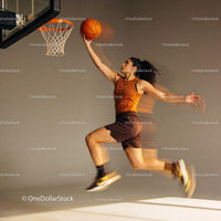 Female basketball player jumping for a layup shot