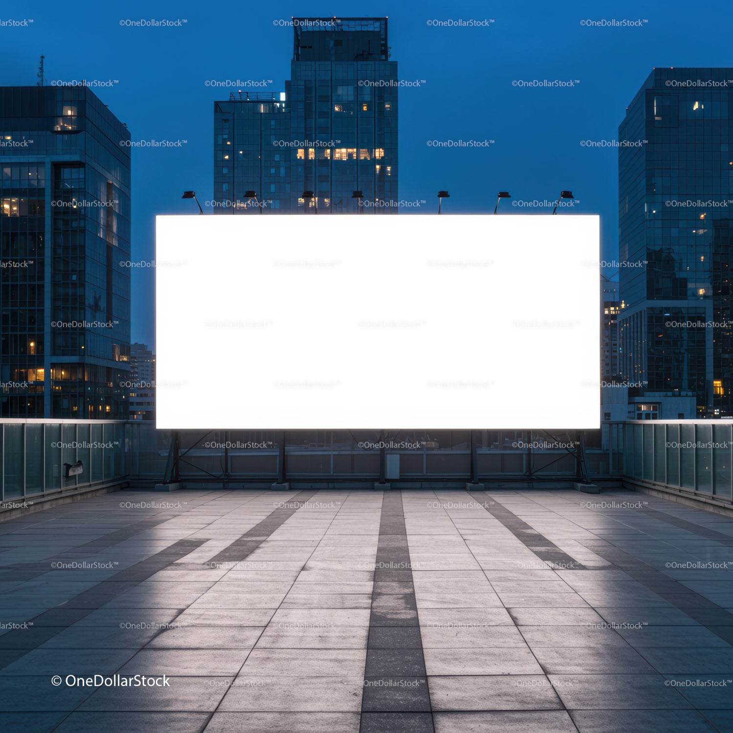 Large illuminated billboard on urban rooftop at dusk