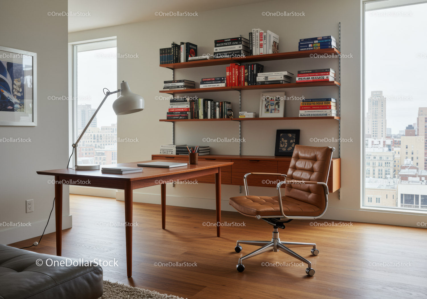 Modern office space with wooden desk and leather chair