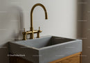 Luxury Concrete Kitchen Sink with Gold Faucet in Modern Interior