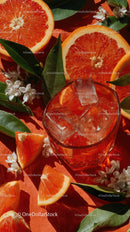 Fresh Juicy Grapefruit Slices with Ice in a Refreshing Summer Drink