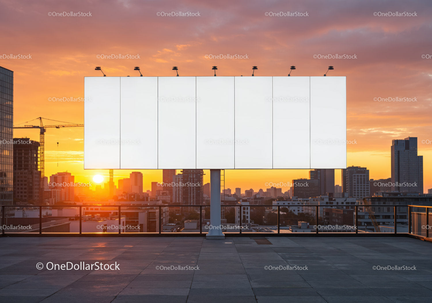 Large City Billboard on Rooftop Against Sunset Sky