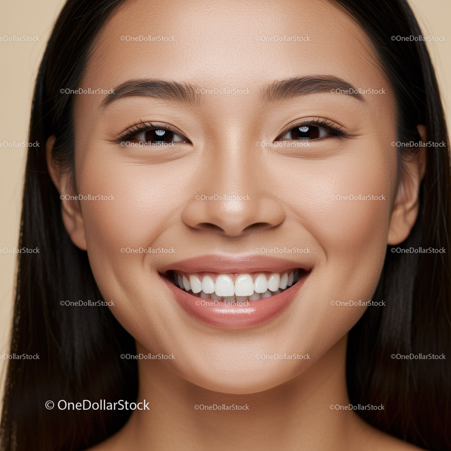 Close up of smiling young woman with flawless skin