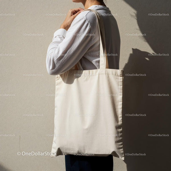 Woman Carrying Plain Canvas Tote Bag on Shoulder JPG Mockup Image