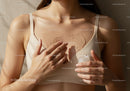 Woman Applying Heart-Shaped Skincare Mask for Beauty and Self-Care