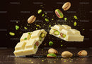 White chocolate bar with whole and chopped pistachios