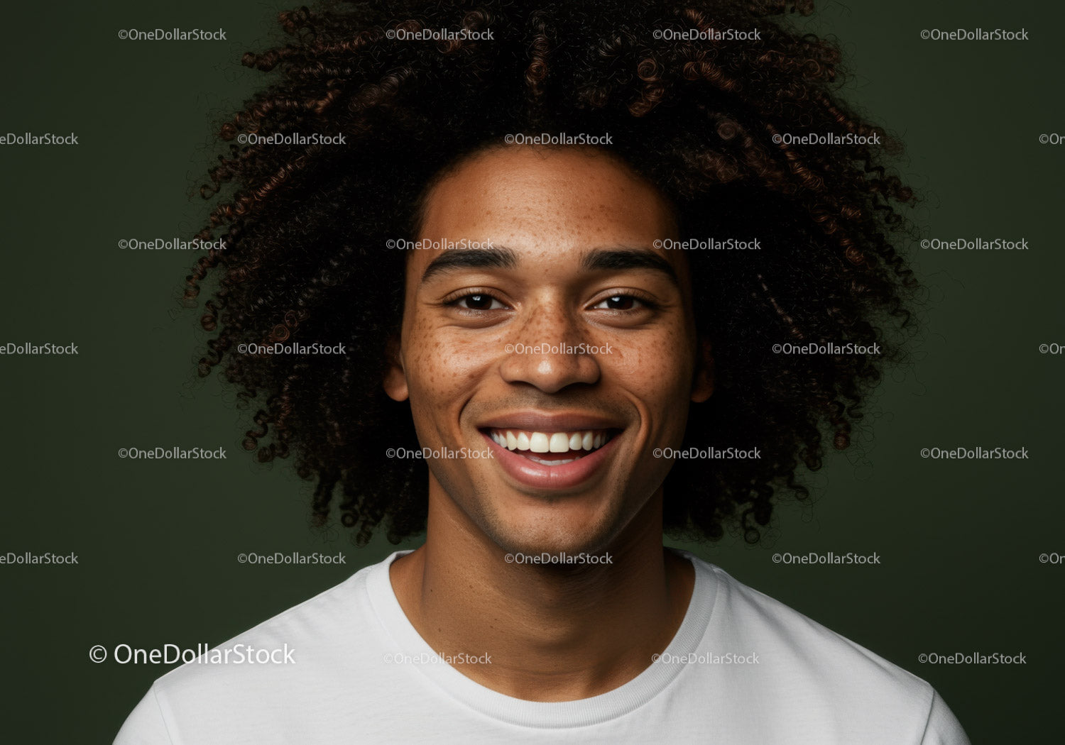 Vibrant Young Man with Curly Hair and Bright Smile in Studio