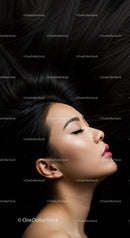 Profile of serene woman with flowing black hair