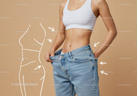 Fit Woman in White Crop Top and Loose Blue Jeans Showing Waist