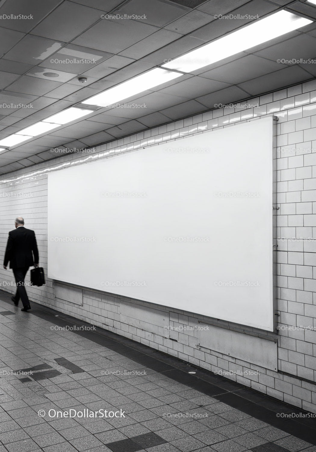 Modern Subway Tunnel with White Billboard and Tiled Walls