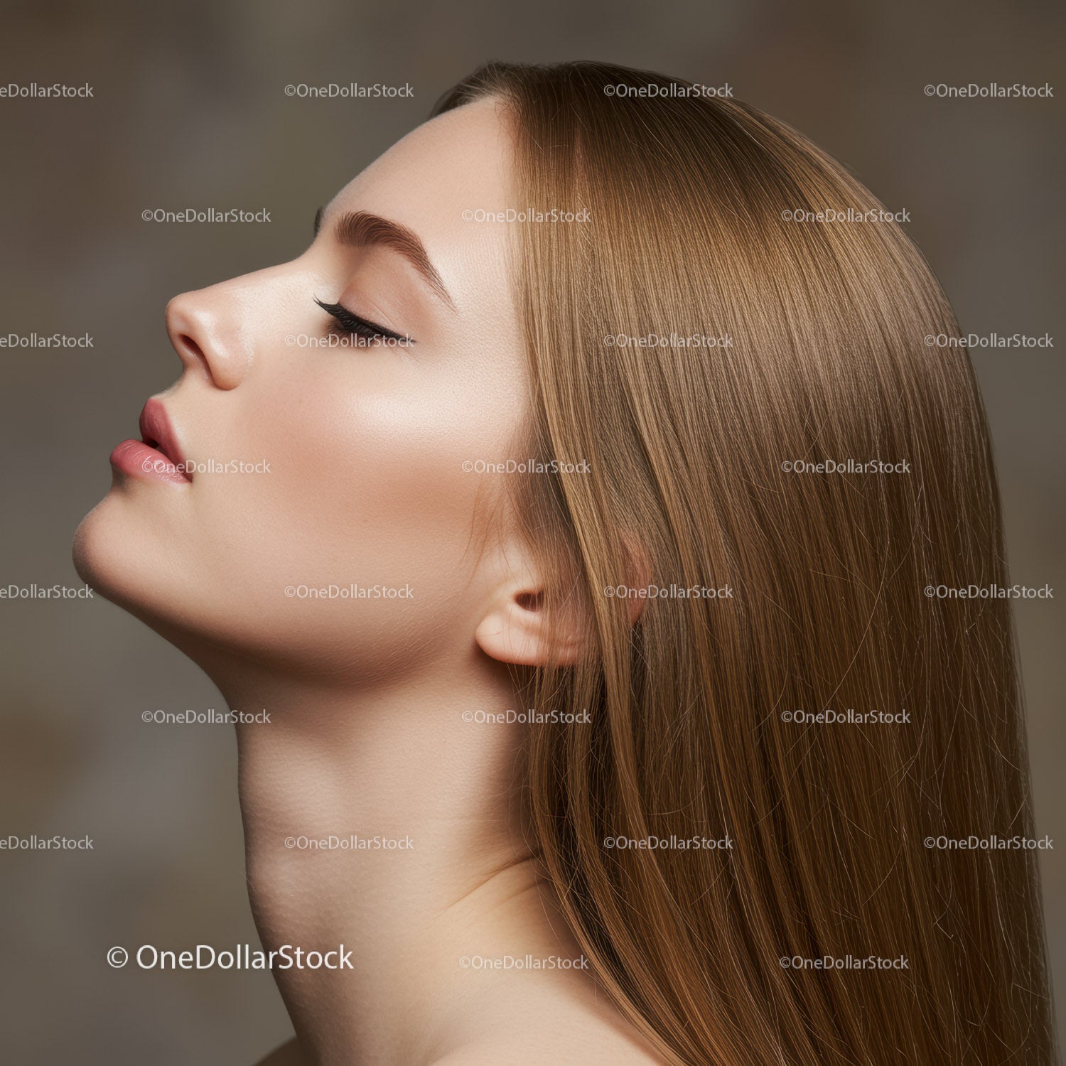 Profile of a serene young woman with flawless skin