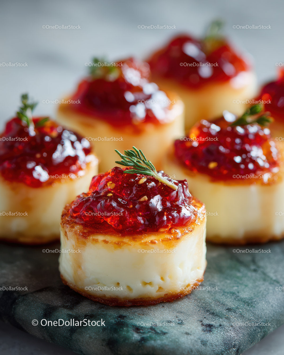 Mini Cheese Canapés with Strawberry Jam Garnished with Herbs