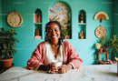 Smiling Woman with Dreadlocks and Jewelry in Colorful Indoor Setting