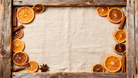 Dried Citrus and Cinnamon Rustic Frame with Linen Background