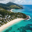 Scenic Tropical Beach with Mountainous Coastline and Crystal Clear Water
