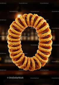 Stack of Crispy Fried Onion Rings in Dark Setting