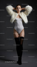 Elegant Model in White Fur Jacket and Bodysuit