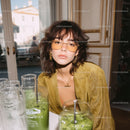 Chic Young Woman in Yellow Jacket and Stylish Glasses Indoor