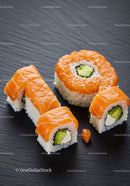 Fresh salmon sushi rolls with avocado and cream cheese