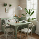 Minimalist Green Interior with Large Indoor Plant and Cozy Dining Setup