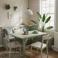 Minimalist Green Interior with Large Indoor Plant and Cozy Dining Setup