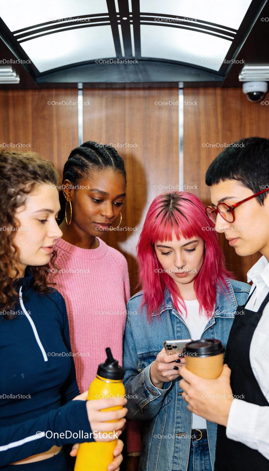 Diverse group of friends sharing moments in elevator