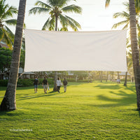 Group Walking on Sunlit Lawn with Blank Banner
