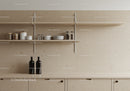 Modern Kitchen with Beige Stone Wall and Stylish Storage