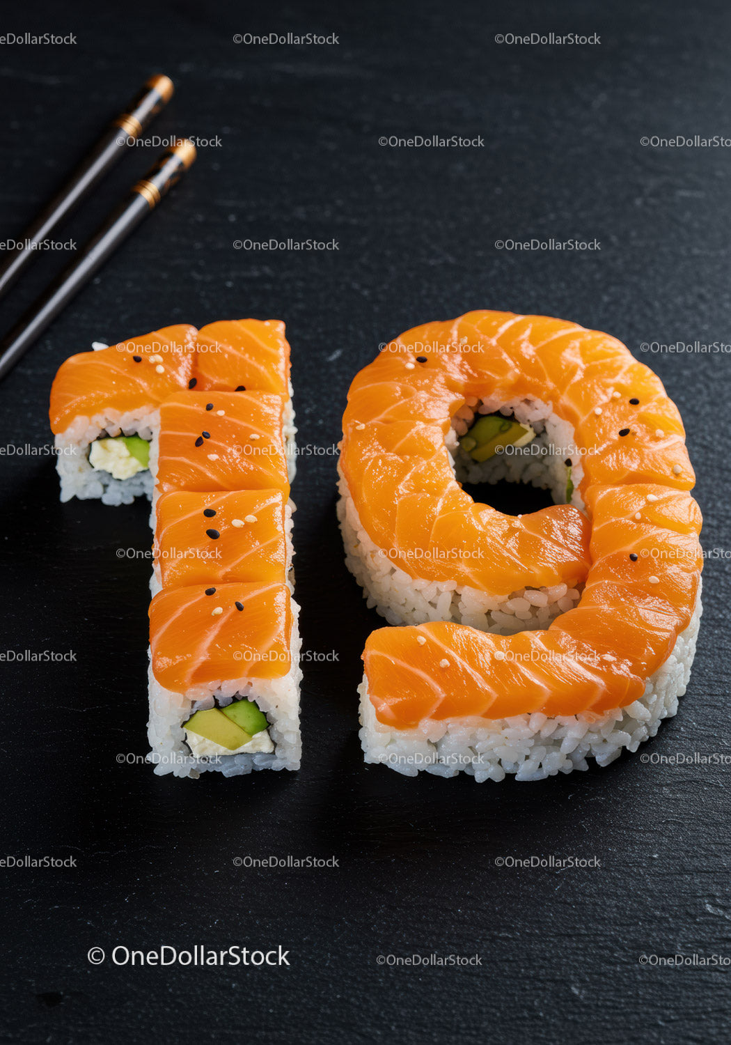 Creative sushi art shaped as number nineteen on black slate