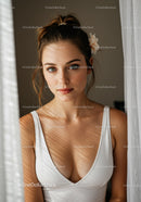 Elegant Woman with Blue Eyes in Natural Light with Curtains