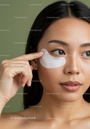 Portrait of a Young Woman Applying Eye Cream for Skincare Routine