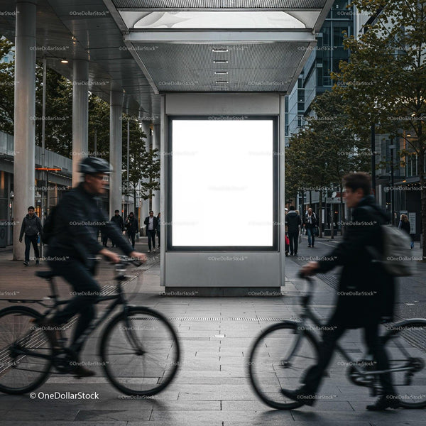 Urban commuters cycling past empty city billboard JPG Mockup Image
