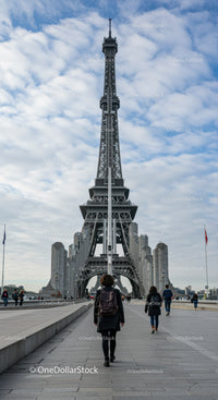 Eiffel Tower in Paris Under Blue Sky with Cloudy Weather