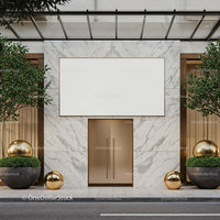 Modern storefront with marble facade and gold accents