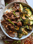 Beef Stew with Rice and Roasted Broccoli on Plate