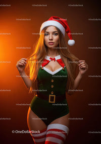Young woman in festive Christmas elf costume with hat