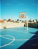 Outdoor Rooftop Basketball Court With City Skyline View