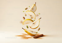 Fresh pear slices with pistachios and cinnamon sticks