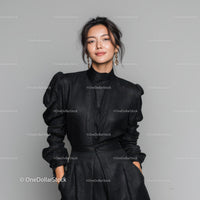 Elegant Woman in Black Outfit with Statement Earrings in Studio