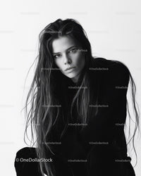 Elegant Black and White Portrait of a Woman with Long Hair