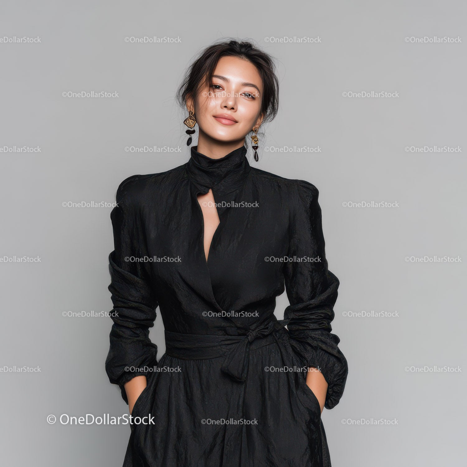 Elegancka kobieta w czarnej sukience pewnie pozuje do fotografii modowej